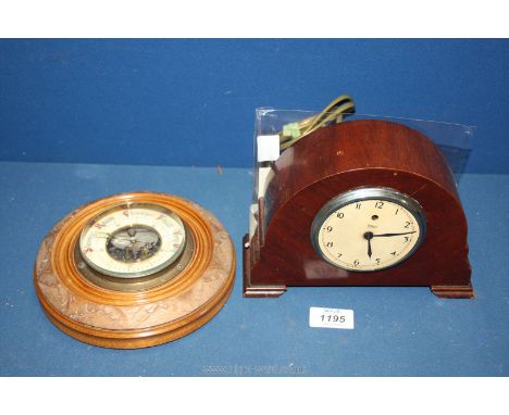 A Victorian Ship's wall Barometer having enamel face and a Temco electric clock in working order, needs glass and some attent