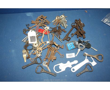 A packet of mainly vintage bottle openers and a bag of over 100 vintage and antique keys.