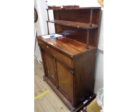 A 1.02m 19th Century mahogany chiffonier with double shelf to top and turned supports over a blind frieze drawer and pair of 