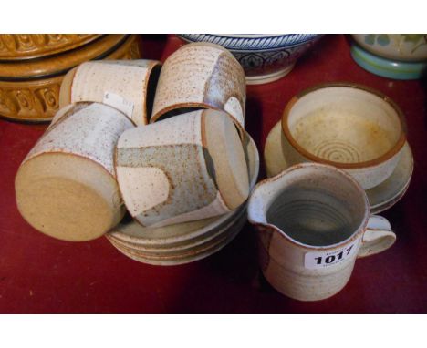 A Studio Pottery part coffee set, comprising four cups and saucers, cream jug and sugar bowl