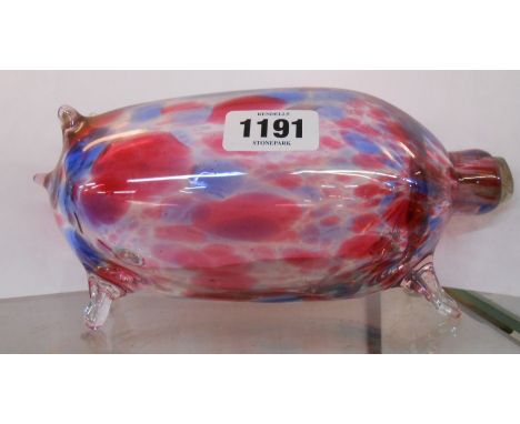 An early 20th Century novelty flask, hand blown in the form of a plump pig with internal enamel decoration in the Nailsea sty