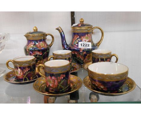 An early 20th Century Maling Ware part coffee set comprising coffee pot, hot water jug, four coffee cans and saucers, sugar b