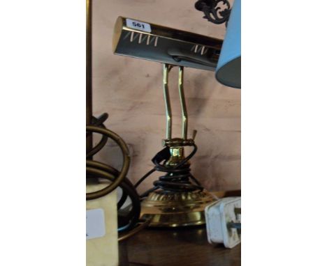 A modern brassed metal banker's lamp