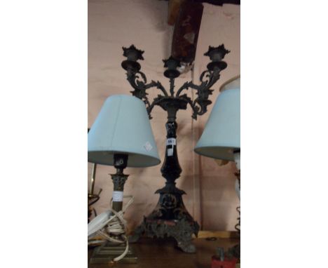 A decorative continental porcelain and cast metal four branch five light candelabrum - old repair