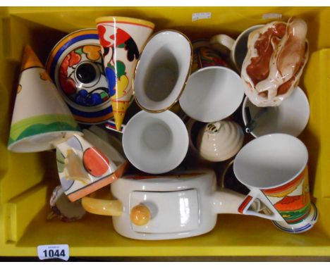 A crate containing a quantity of ceramic items including Saddler, Clarice Cliff style teapot, similar Moorland conical sugar 