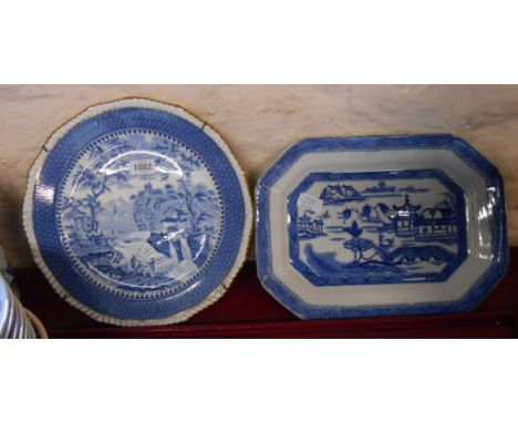 A large late 19th Century Wedgwood bone china round platter with a blue transfer printed decoration depicting a rustic scene 