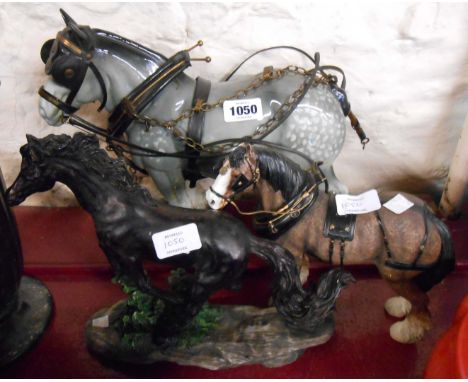 A large ceramic heavy horse model - sold with two resin horse models - various condition