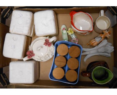 A box containing assorted ceramic items including majolica Toby jug, Father Christmas character jug, a set of terracotta kitc