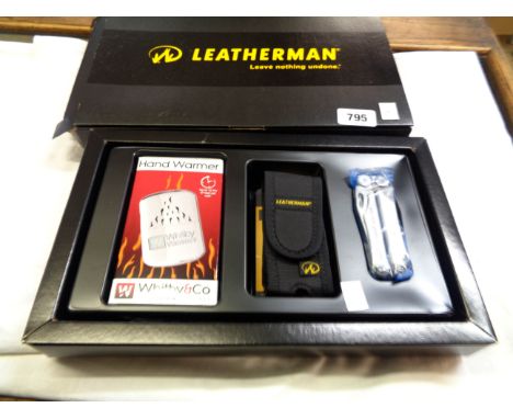 A boxed Leatherman presentation set comprising Whitby &amp; Co. hand warmer, wave multi-tool with pouch and carabiner - The L