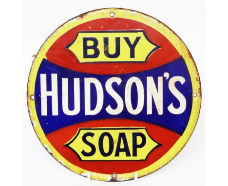 An old small circular Hudsons Soap enamel advertising sign with Buy Hudsons Soap coloured enamels
