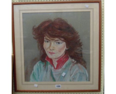 M. Robbins: a framed pastel portrait of a lady with red hair - signed and dated '86