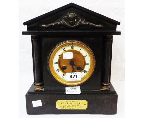 A late Victorian black slate cased mantle clock of architectural design with Mougin eight day gong striking movement