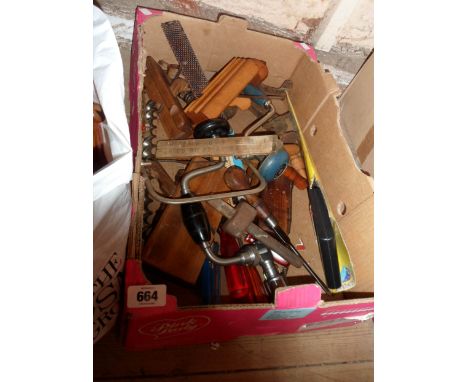 A box containing a quantity of antique and later wood working and other tools