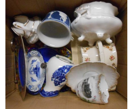 A box containing assorted ceramic items including cheese dish, Brent Church souvenir moustache cup, etc.