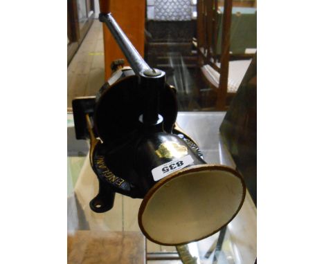 A vintage Spong cast iron coffee grinder