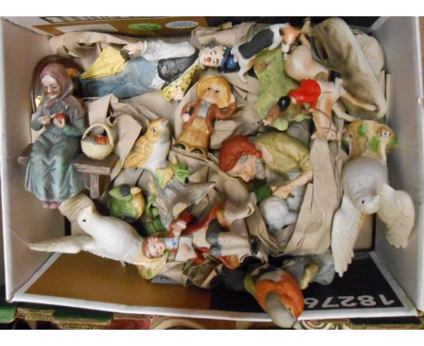 A box containing a quantity of ceramic figurines