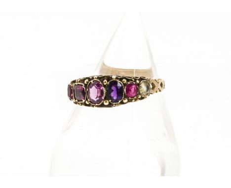 A 19th Century multi gem set posy ring, the collet settings on a scroll gallery on engraved yellow metal shank, ring size S 1