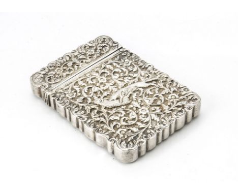 A nice early 20th century Indian silver calling card case, the body and hinged lid with ornated scrolling foliage and birds w