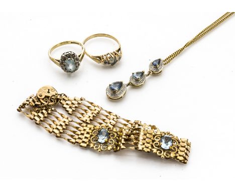 A 9ct gold padlock clasp gate bracelet, having three oval cut topaz to five bar linked chain, a mystic topaz and diamond neck