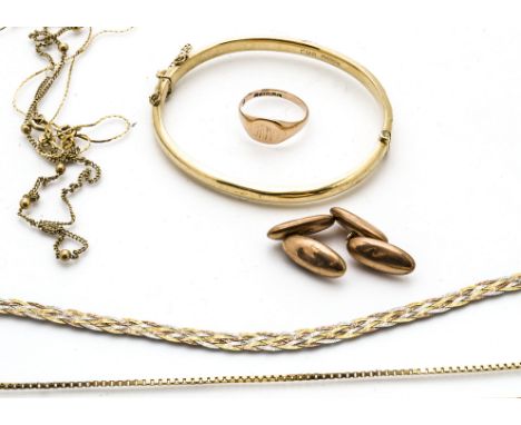 A small quantity of gold, including a pair of 9ct gold cufflinks, an oval gold bangle, 9ct gold signet ring and four gold cha