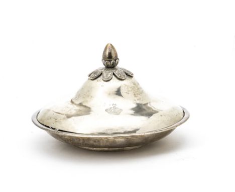 A vintage Middle Eastern white metal covered serving dish, circular with domed lid having acanthus leaf and flower bud finial