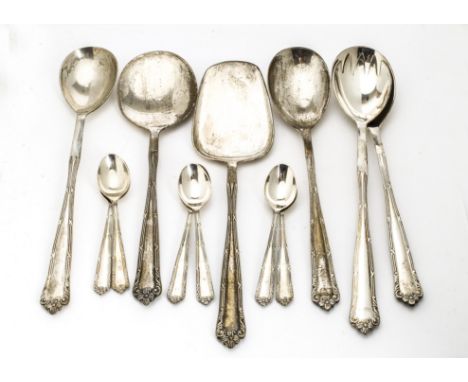 A group of vintage Indian white metal flatware, all marked silver, including a set of six coffee spoons, pair of salad server