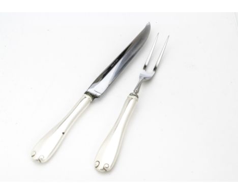 A modern silver handled carving knife and fork from Tiffany &amp; Co  