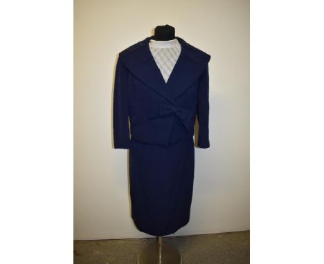 A late 1950s/ early 60s blue suit by Diane Warren, Blackpool, and a white blouse.