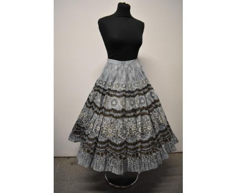 A 1950s novelty print full circle skirt in crisp cotton.