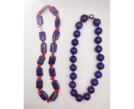 Two statement Lapis lazuli knotted necklaces, a large round bead necklace with intense colour and a rectangular lapis and cor