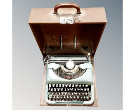 A vintage Imperial typewriter in case 