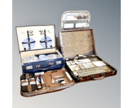 An antique brass and glass fire screen together with a wooden artist's box, picnic set in case and further cased travel set 