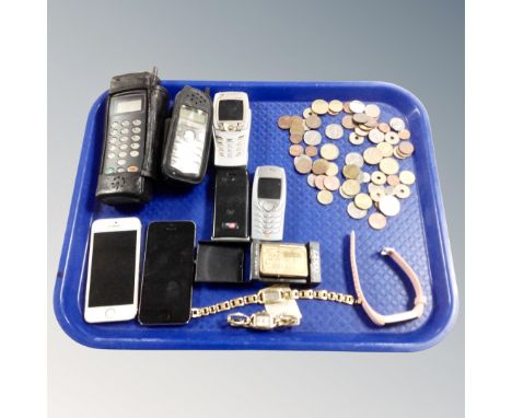 A tray of foreign coins, vintage and later mobile phones, iphones, brass lighter, watches etc 