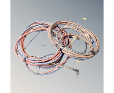 Two welding / cutting tools with hoses 