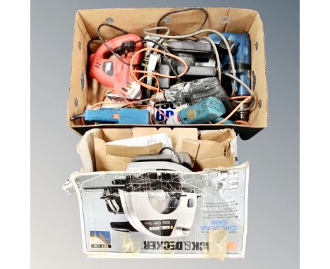 A Black and Decker 1020W 55MM circular saw, boxed, together with a further box of power tools 