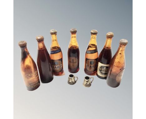 Seven miniature beer bottles, sealed, Harp lager and Guinness, two miniature tankards 