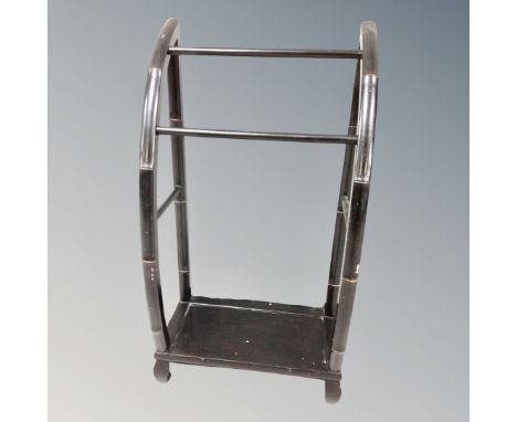 A black lacquered stick stand