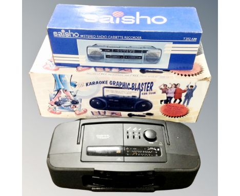 A Saisho stereo radio cassette recorder, boxed, together with an Arbiter Karaoke blaster, boxed and further Daewoo portable C