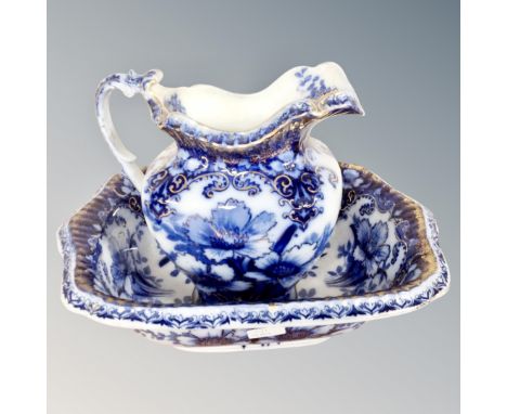 A Victorian floral patterned wash jug and basin 