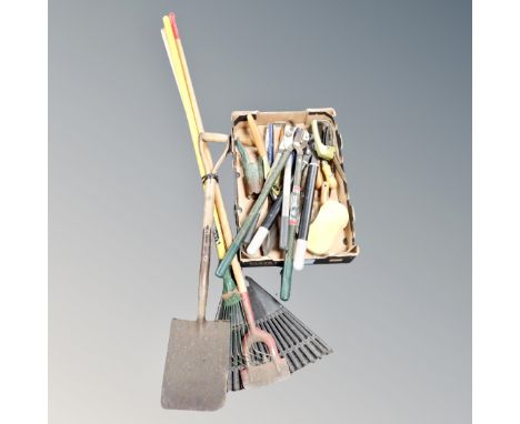 A bundle of garden tools together with a further box containing gardening hand tools 