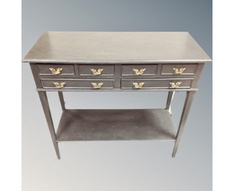 A contemporary six drawer painted console table, 75cm high by 82cm wide by 35cm deep.