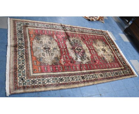 A Fine Caucasian Hand Made Carpet, 223x138cms 