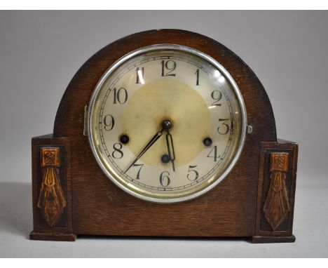 A Mid 20th Century Oak Westminster Chime Mantle Clock with Key and Replacement Pendulum 