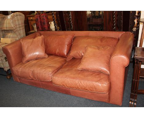 A brown leather rectangular two-seater sofa, 206cm wide