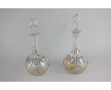 A pair of 19th century Austrian glass spirit decanters of globular form, the floral design marked Whisky and Port (a/f - brok