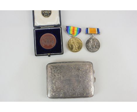 A First World War Service medal and Victory medal, to 370118 PTE G Carroll RAMC, together with a George V silver cigarette ca