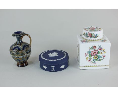A Doulton Lambeth pottery vase, a Wedgwood Jasperware jar and cover, and a Coalport Ming Rose tea caddy