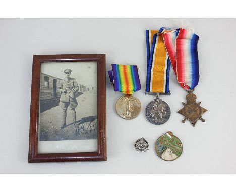 A First World War medal group comprising War medal, Victory medal, and 1914-15 Star, to Capt P F Arnold RAF, together with a 