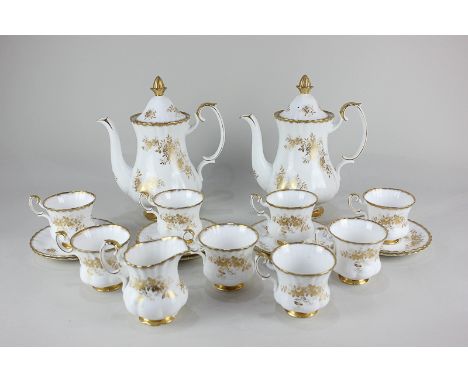 A Royal Albert porcelain Antoinette pattern part coffee set, including two coffee pots, milk jug (a/f) eight cups (1 a/f) and