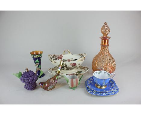 A George Jones 'Our Roses' oval pedestal tureen and cover on stand, a Carlton Ware vase, carnival glass decanter and stopper,